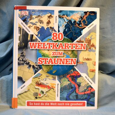 Buchtitel: 80 Weltkarten zum Staunen. Abbildung des Buchcovers.