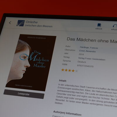 Foto: Das E-Book "Das M&auml;dchen ohne Maske" aus der Onleihe zwischen den Meeren, aufgerufen am eCircle der Stadtbibliothek.